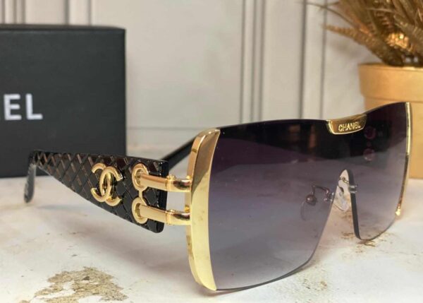 Lentes Chanel Negros con Dorado